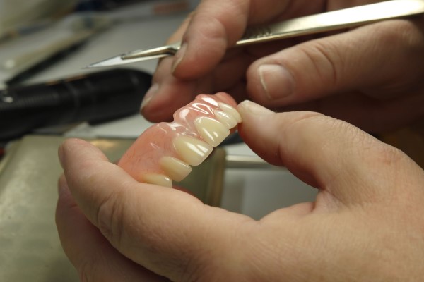 What Is Relining In Denture Repair?